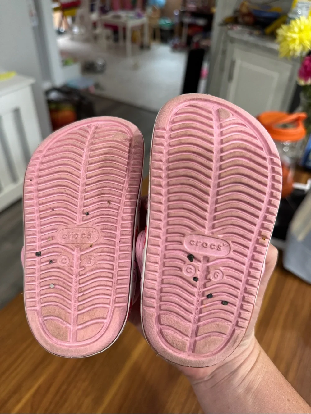 CROCS Kids Pink Glitter Clogs with Red Flower Charms